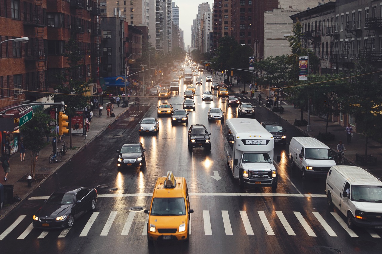 A busy highway with multiple lanes of traffic