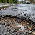 How Trapped Moisture Damages Asphalt From Beneath