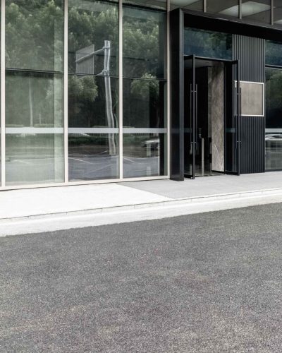 modern-office-building-with-asphalt-ground-2025-01-29-05-13-34-utc_11zon