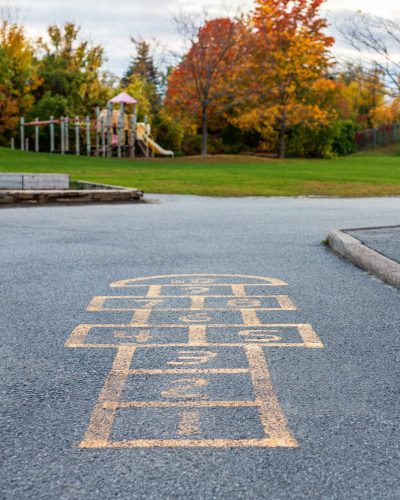 school-building-and-school-yard-with-hopscotch-and-2025-01-07-05-57-37-utc_11zon